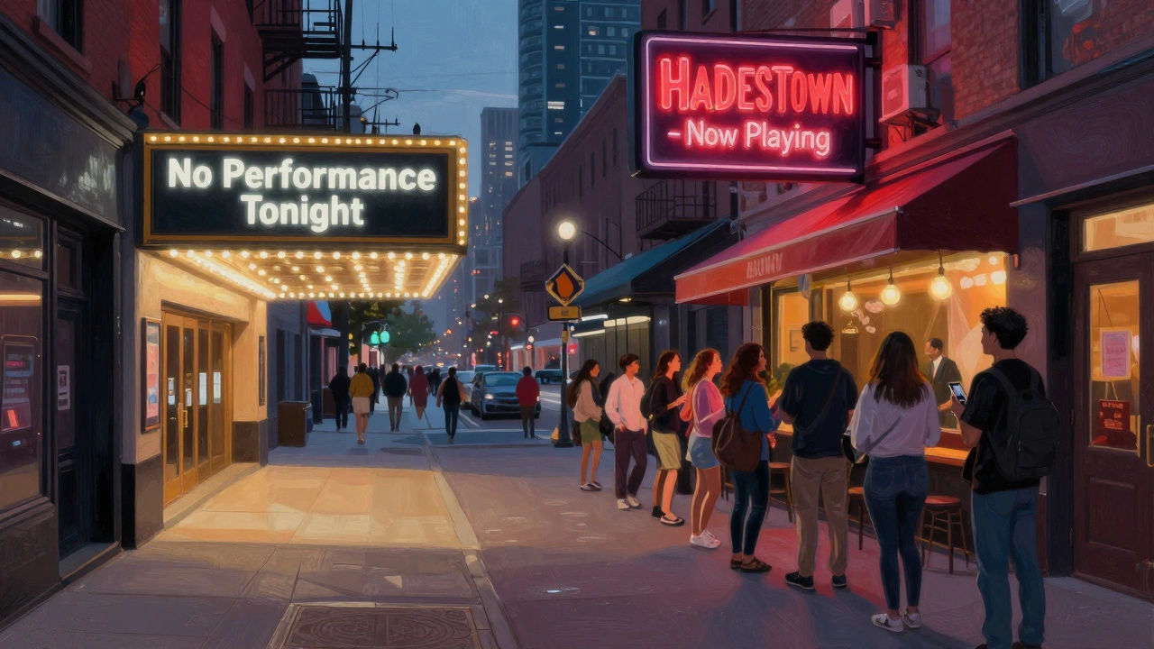 Crowd lining up outside a vibrant Off-Broadway theatre on a Monday night.